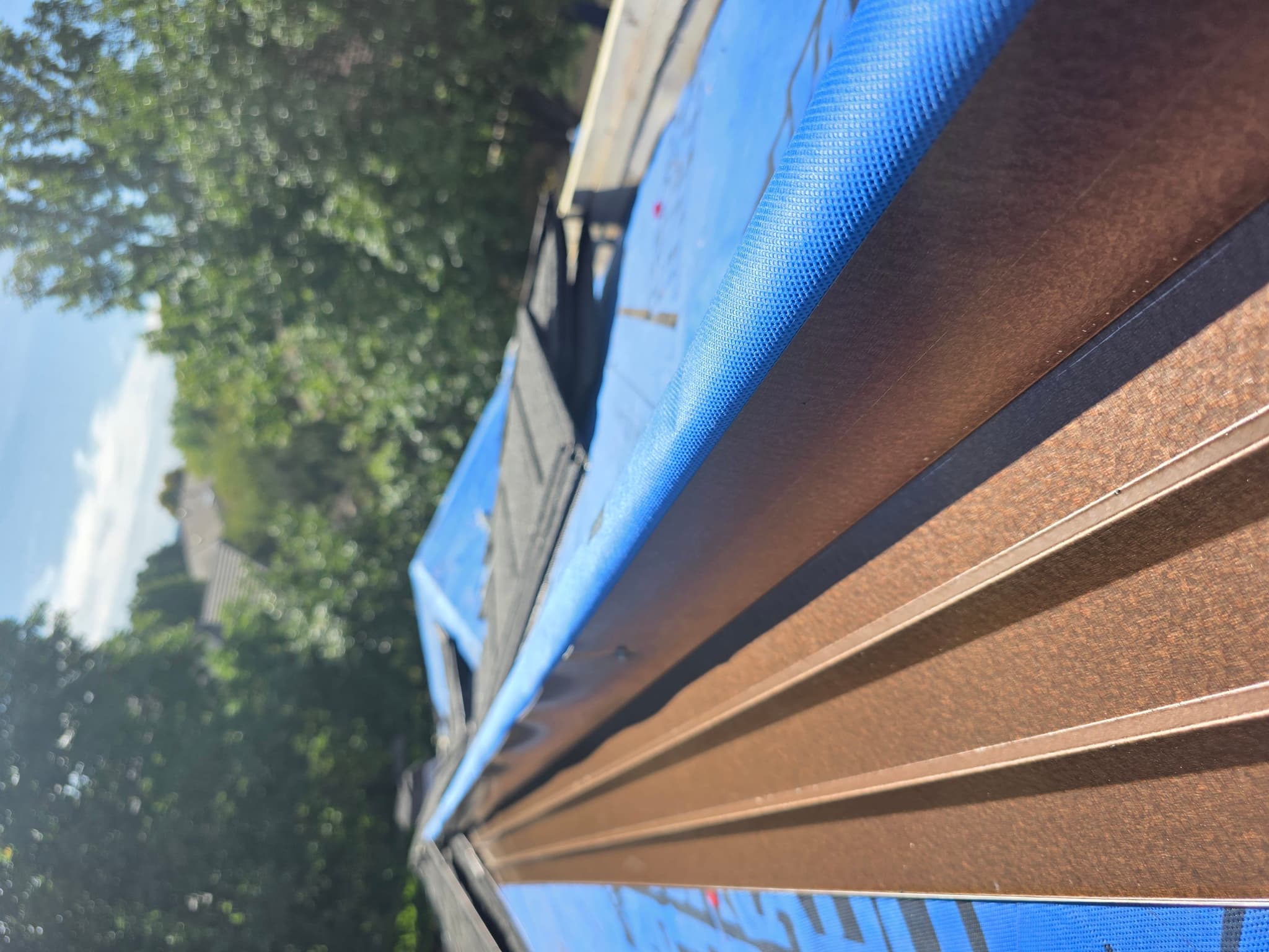 Stone coated steel roofing